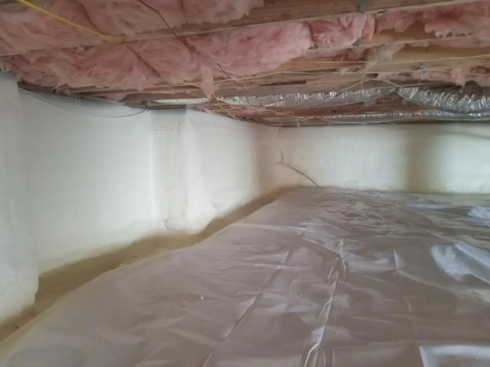 Crawl space encapsulation with closed-cell spray foam for Commercial Roof Restoration in Jefferson